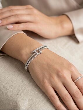 49: Cubiz Zirconia Pavé Silver Bypass Bracelet